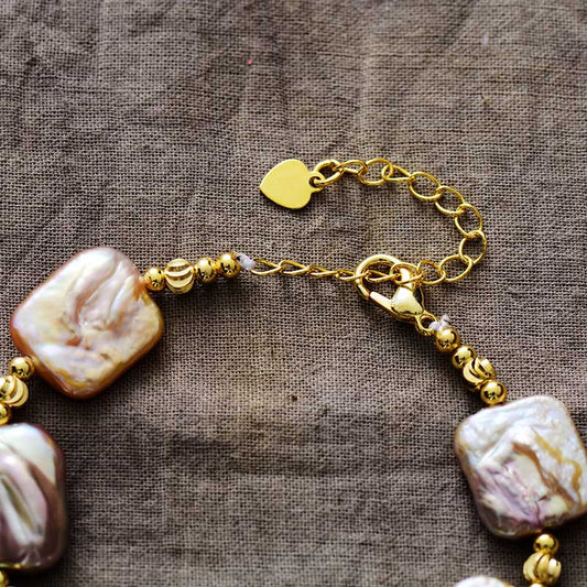 MantraChakra Pearl Bracelet with a Heart Charm