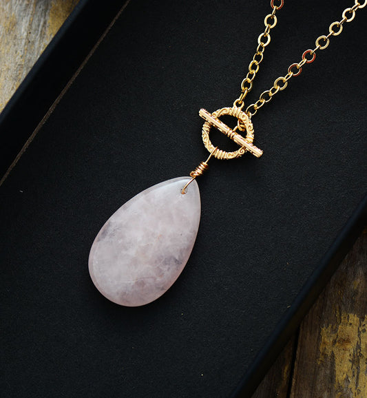 Natural Rose Quartz Teardrop Pendant Necklace with a Gold Plated Chain