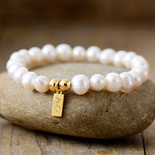 Handmade Pearl Beaded Bracelet with a Gold Plated Tag