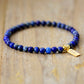 Handmade Natural Lapis Lazuli Beaded Bracelet with a Gold Plated Tag