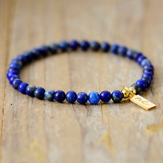 Handmade Natural Lapis Lazuli Beaded Bracelet with a Gold Plated Tag
