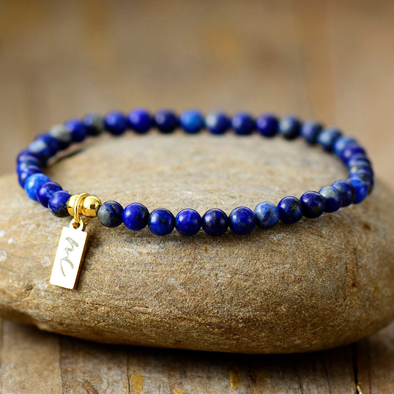Handmade Natural Lapis Lazuli Beaded Bracelet with a Gold Plated Tag