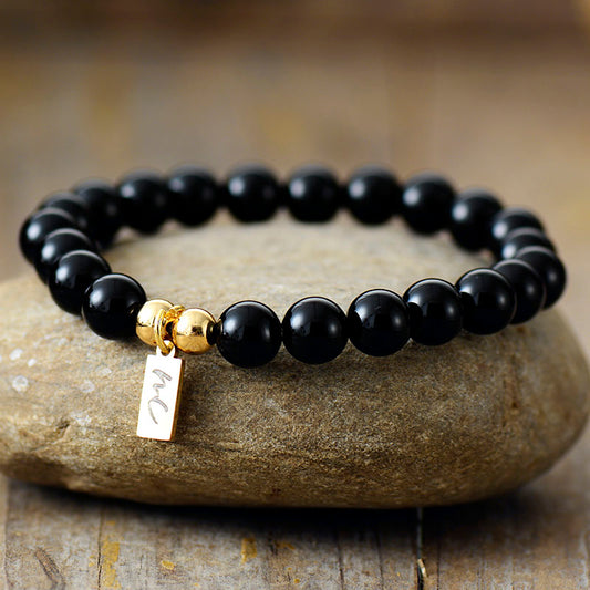 Handmade Black Onyx Beaded Bracelet with a Gold Plated Tag