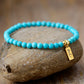 Handmade Natural Turquoise Beaded Bracelet with a Gold Plated Tag