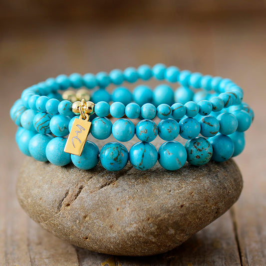 Handmade Natural Turquoise Beaded Bracelet with a Gold Plated Tag