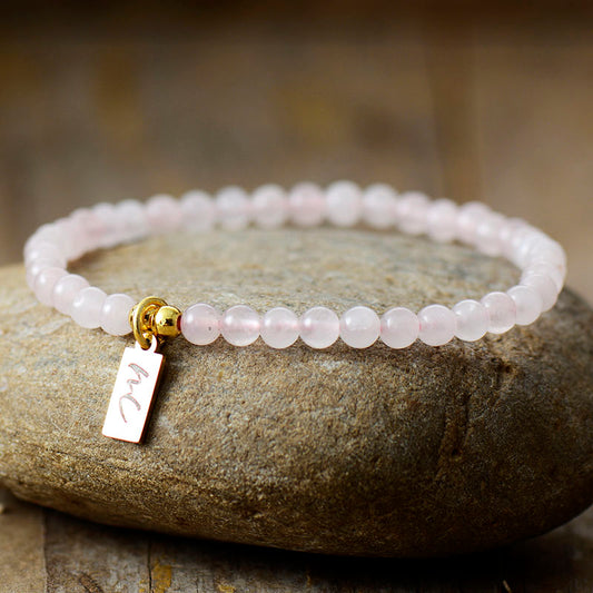 Handmade Natural Rose Quartz Beaded Bracelet with a Gold Plated Tag