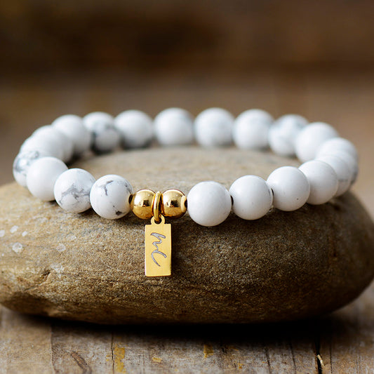 Handmade Natural Howlite Beaded Bracelet with a Gold Plated Tag