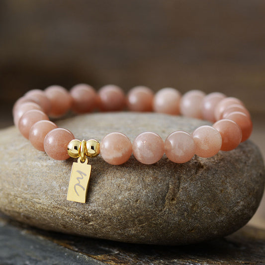 Handmade Sunstone Beaded Bracelet with a Gold Plated Tag