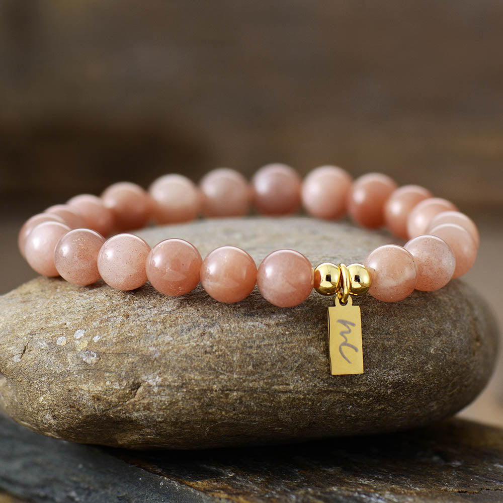 Handmade Sunstone Beaded Bracelet with a Gold Plated Tag