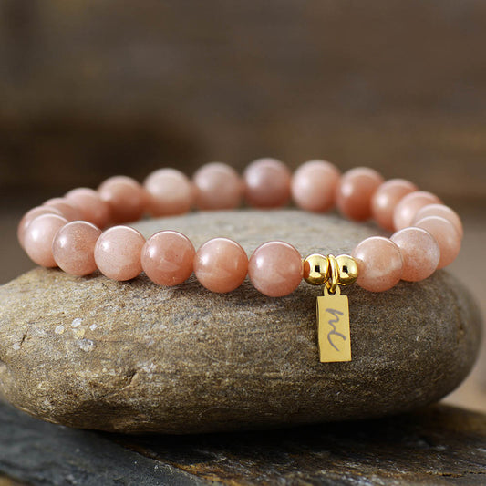 Handmade Sunstone Beaded Bracelet with a Gold Plated Tag