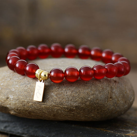 Handmade Carnelian Beaded Bracelet with a Gold Plated Tag