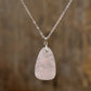 Rose Quartz Pendant Necklace with a Rhodium Plated Chain