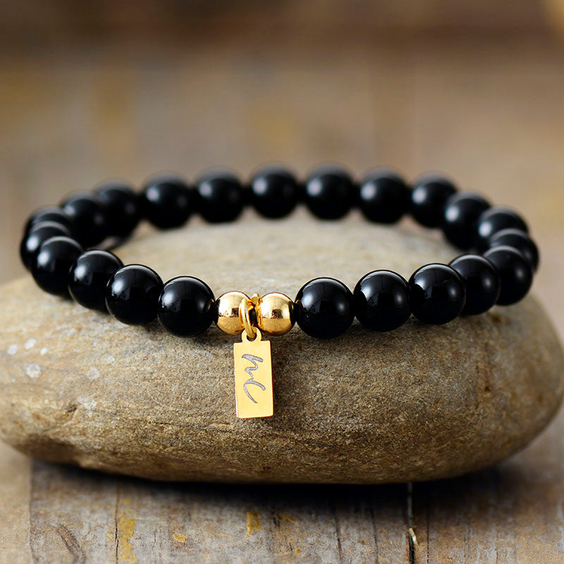Handmade Black Onyx Beaded Bracelet with a Gold Plated Tag
