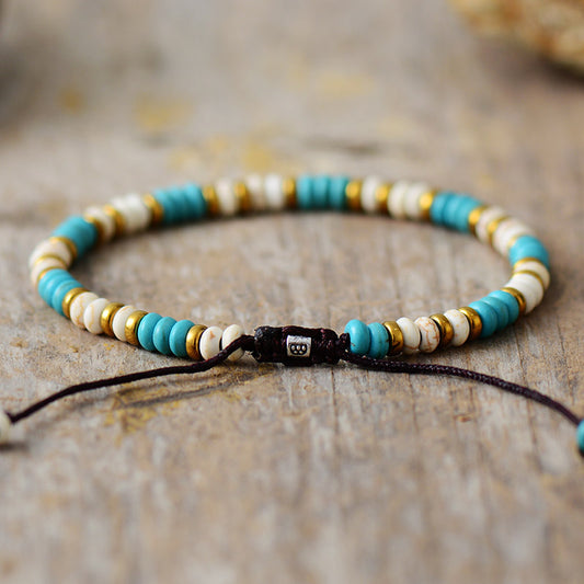 Handmade Turquoise Howlite and Gold Beaded Bracelet - 6.7 inches + adjustable